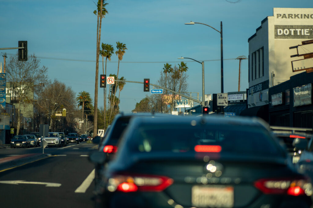 Driving down the road with Reseda Blvd sign in sight. 